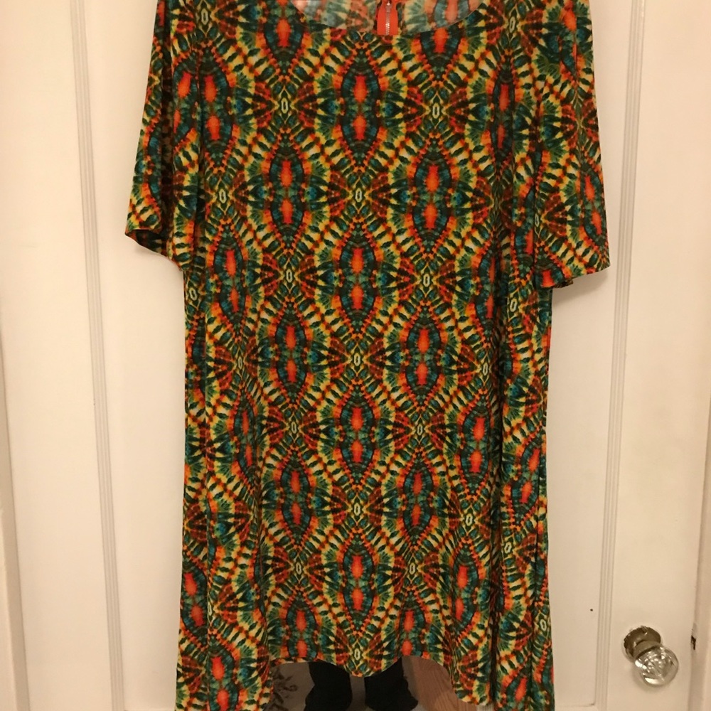 Crazy patterned peaked hem tunic.